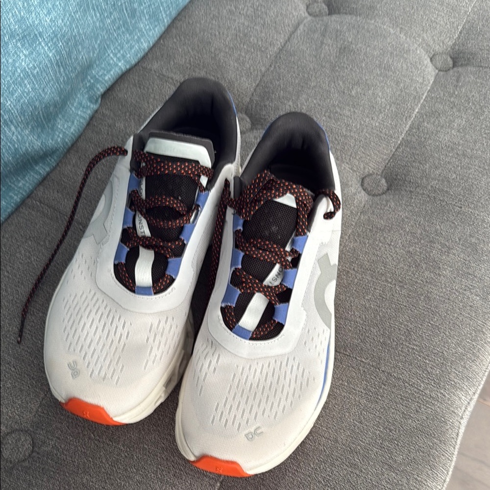 White and Orange Athletic Shoes